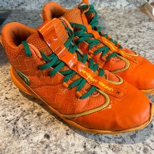 Under Armour Kids' Vibrant Orange and Green Baseball Cleats